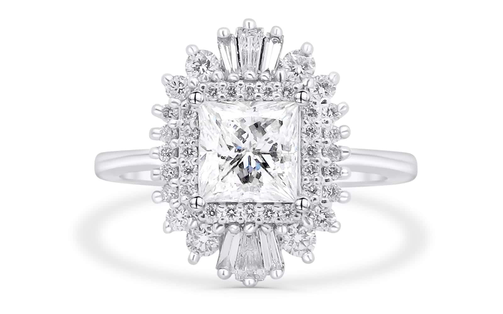 14-karat white gold ballerina engagement ring with a 1.01 carat princess-cut diamond, surrounded by round and baguette-cut natural diamonds, available in Calgary.
