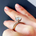 A wonderful hidden halo setting holding a stunning diamond.